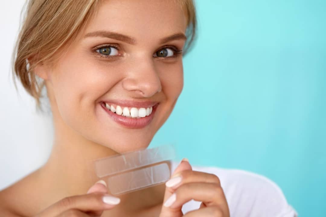 What are the Side effects of home teeth whitening kits?